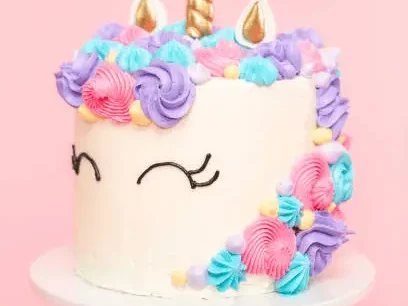 Unicorn cake decorated with multicolor 